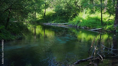 The most famous source of natural mineral water, wellspring. Green welspring at the maple mountaim in Mari El, Russia photo