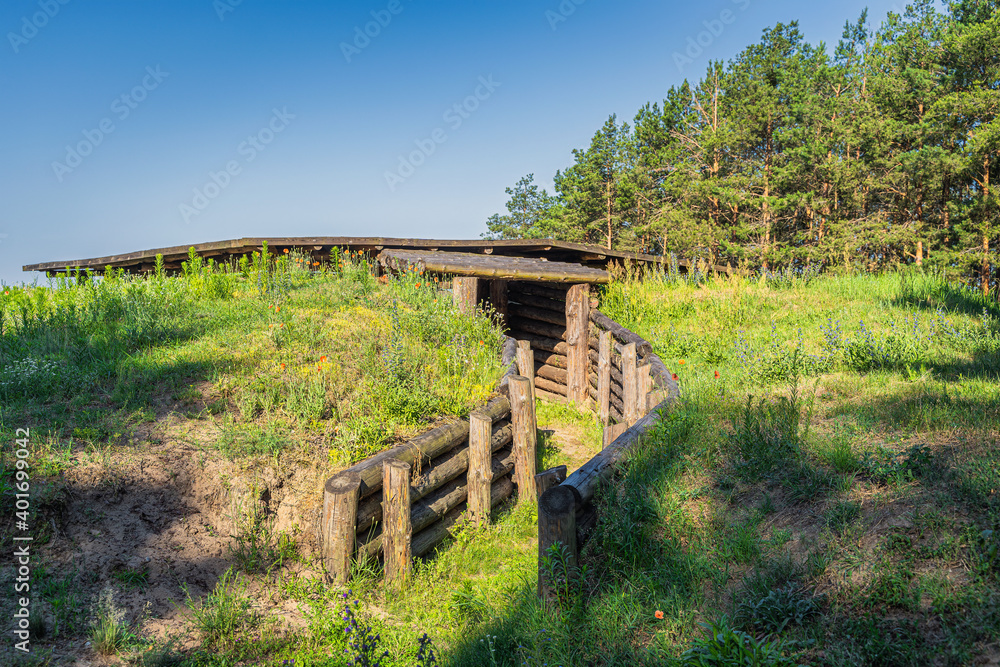 Entrance to old wooden bunker from World War 2 with oversight of Odra River, natural border between Poland and Germany, near Gozdowice Entrance to old wooden bunker from World War 2 with oversight of Odra River, natural border between Poland and Germany, near Gozdowice
