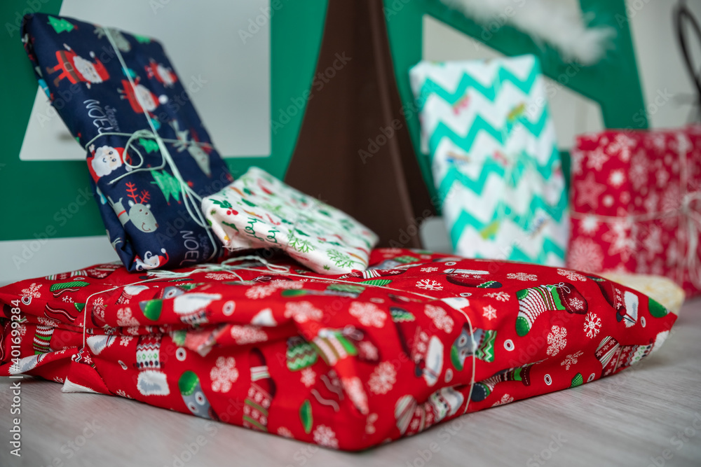 Obraz premium Gifts zero waste wrapped under christmas tree