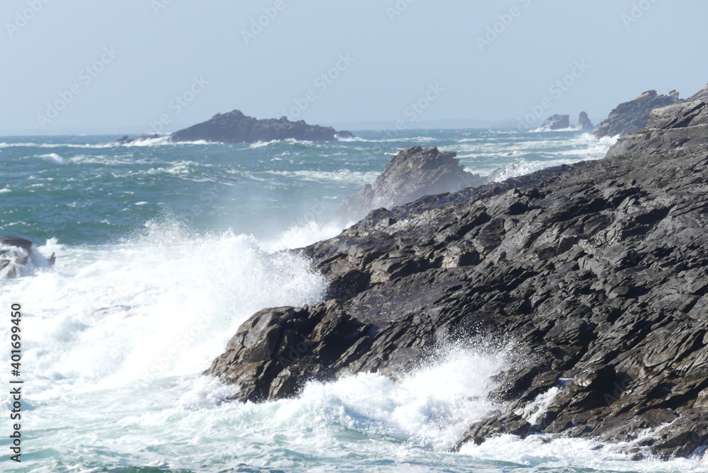 waves breaking on rocks