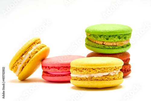 Fototapeta Naklejka Na Ścianę i Meble -  Delicious multicolored macaroons on white background.