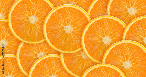 Many slices of ripe juicy orange. View from above. Natural antioxidant.  Fruit background for banners or packaging design of juice, sweet carbonated drinks, cosmetics, essential oils, vitamins.