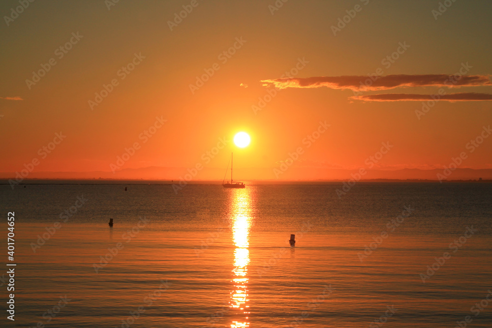 The amazing sunset in mediterranean sea, port camargue, South of France