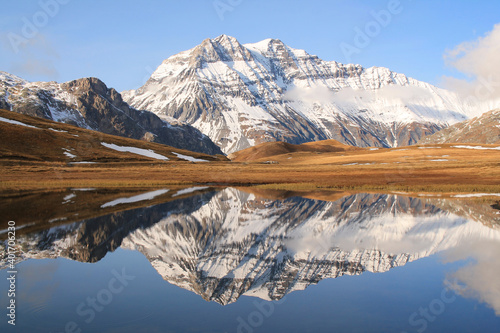 Amazing reflections in lake Plan du Lac Bellecombe looking towards La Grande Casse in the French alps
 photo