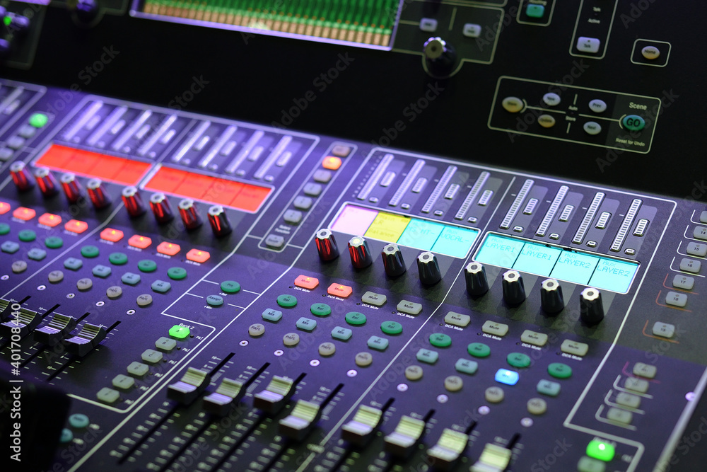 Sound engineer mixing console at work. Sound engineer mixing console at work.