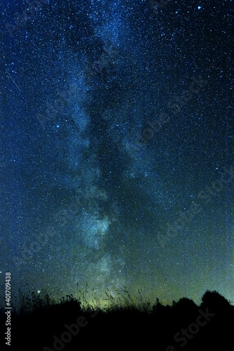 Vertical photo of clear night sky with milky way and huge amount of stars.