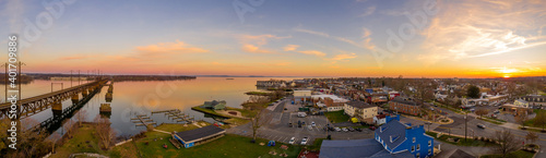 Aerial sunset panorama of Havre de Grace Maryland with orange sky and clouds reflecting on the Susquehanna River and the  Chesapeake Bay one of the best small towns in America photo
