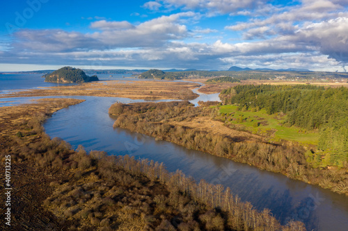 Aerial View of the North Fork of the Skagit River. Drone view of the north fork of the Skagit River running through the valley delta near Conway, Washington. The Skagit Wild and Scenic River System. © LoweStock