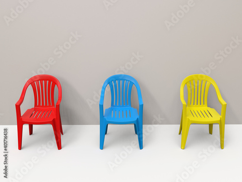 Red  blue and yellow normal plastic chairs in white room