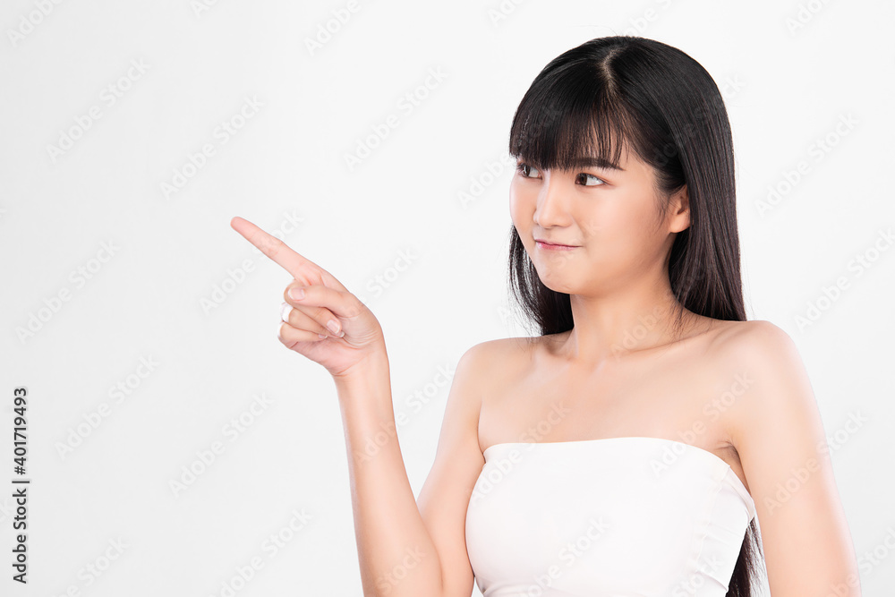 Beautiful Young asian Woman with Clean Fresh Skin, on Pink background, Face care, Facial treatment. Cosmetology, beauty and spa. Asian women portrait Beautiful Young asian Woman with Clean Fresh Skin, on Pink background, Face care, Facial treatment. Cosmetology, beauty and spa. Asian women portrait