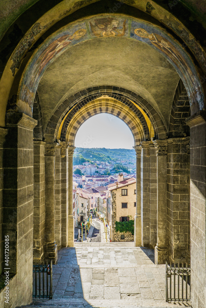 View from the main door of the Cathedral of Our Lady of the Annunciation or Cathedrale Notre-Dame du Puy on the medieval streets of the old town of Le Puy en Velay, Auvergne, France