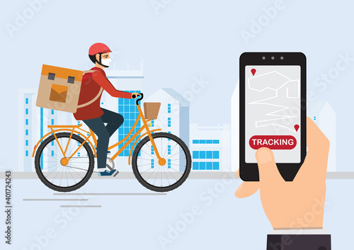 Courier on a bike with parcel box on the back tracking an order using his smartphone.