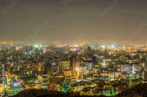 Night cityscape of Tehran city with colorful light effect