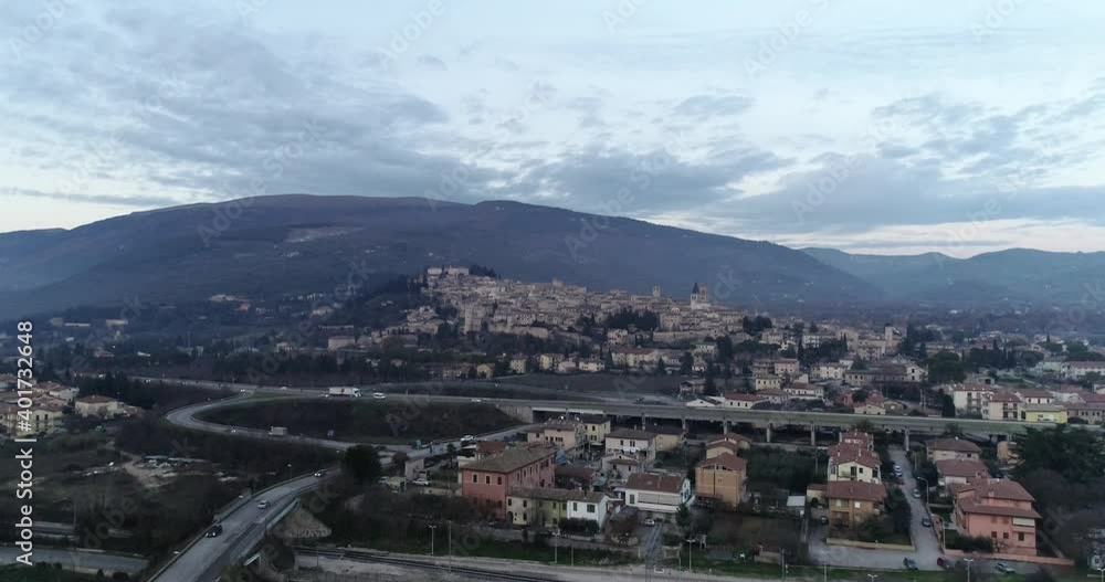 Aerial drone view of the city of Spello in Umbria, Italy. Overhead shot while walking around the symbolic buildings of the city.
Aerial drone view of the city of Spello in Umbria, Italy. Overhead shot while walking around the symbolic buildings of the city.