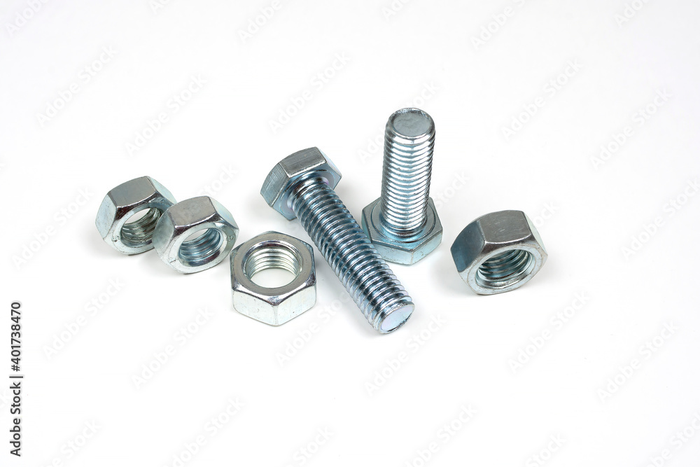 metal bolts and nuts on a white background metal bolts and nuts on a white background