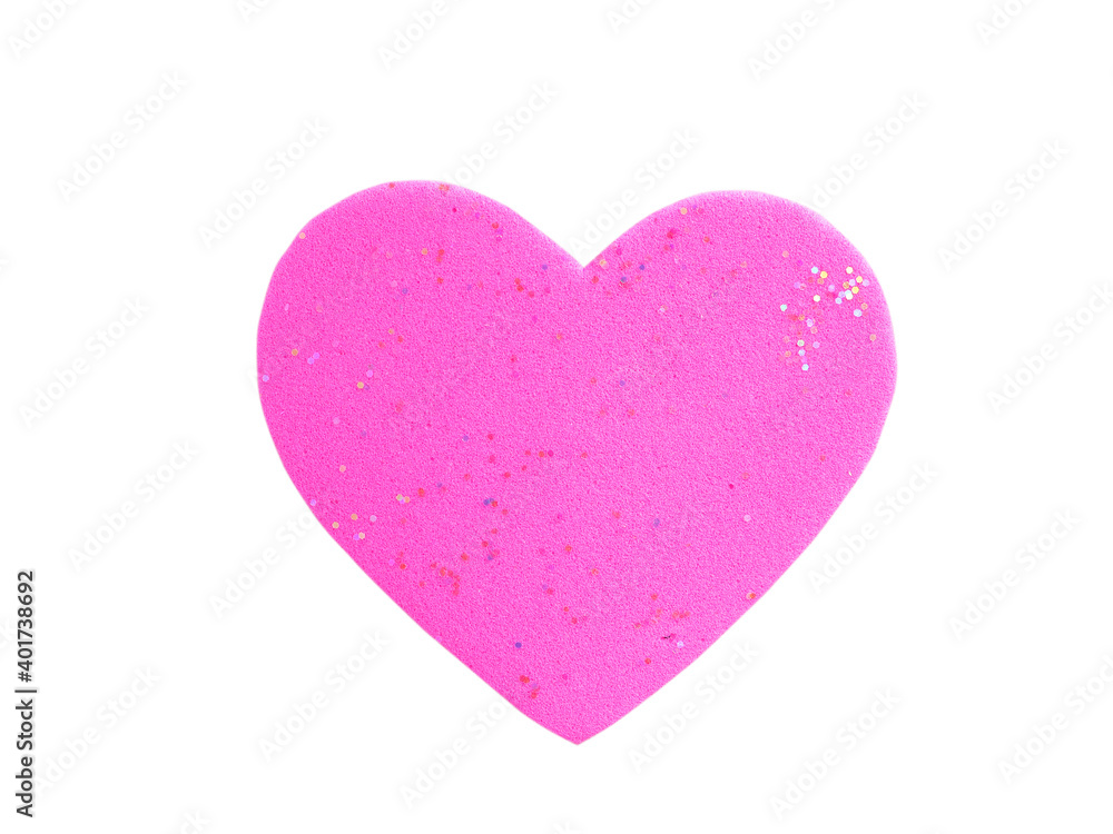 Pink heart shape made of foam isolated on a white background.  Concept for love and encouragement..
