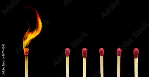 Social Distancing and Domino Effect Concept : Abstract image of many matches keep distance from used matches to reduce reflection and stop domino effect for social distancing campaign.