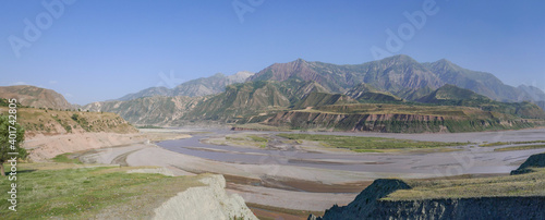 Panoramic view on the Vakhsh valley and Vakhsh river, between Roghun dam and Garm, Tajikistan photo