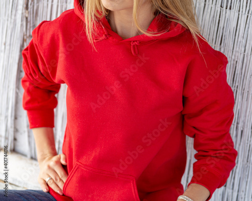 Wallpaper Mural Unrecognizable blon woman wears red hoodie. Casual christmas outfit. Clothing design with copy space for mockup. Torontodigital.ca