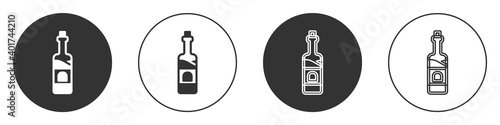 Black Bottle of wine icon isolated on white background. Circle button. Vector.