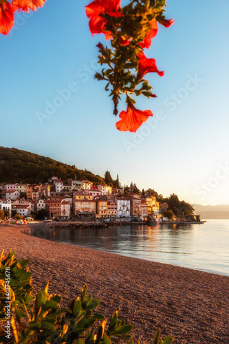 Moscenicka draga Istria in Croatia. Nice sea and beach photo with town and port. Nice clear sunrise in the morning. Overview of the beautiful coast of the historic city