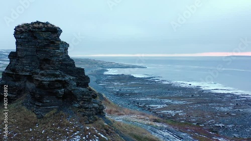 Dva Brata, Murmansk. Two weathering rocks. Two weathering rocks on the Rybachy Peninsula. Aerial epic view. photo
