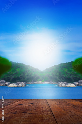 Fototapeta Naklejka Na Ścianę i Meble -  Wooden table top, Beauty seascape under blue clouds sky, mountain blue sea background