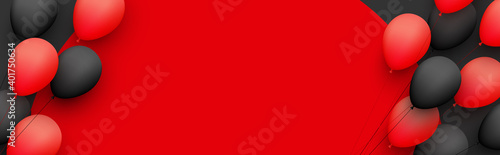 Black and red balloons with threads on red round background.