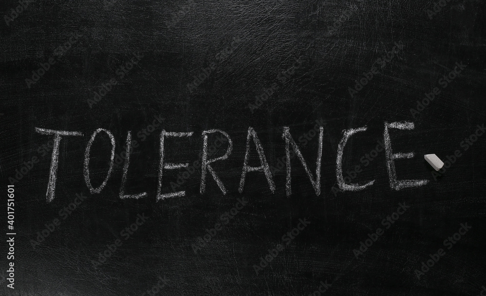 Fototapeta premium Tolerance word chalk hand drawn on blackboard