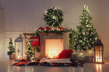 Beautiful Christmas themed photo zone with fireplace and fir decor