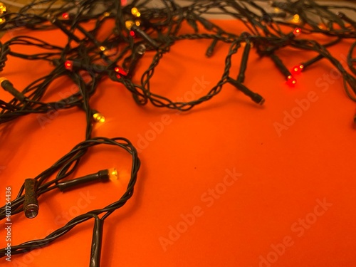 Fesitve Christmas background with garland lights. New Year colorful abstract backdrop photo