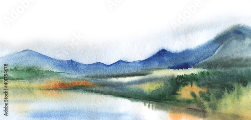 Autumn watercolor blurry landscape. Peaceful view of lake bank with calm surface among thick colorful forest and dim blue high mountains against cloudy sky. Hand drawn illustration on textured paper