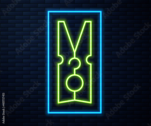 Glowing neon line Old wood clothes pin icon isolated on brick wall background. Clothes peg. Vector.