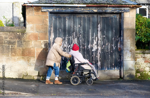Senior elderly vulnerable person in wheelchair for mobility