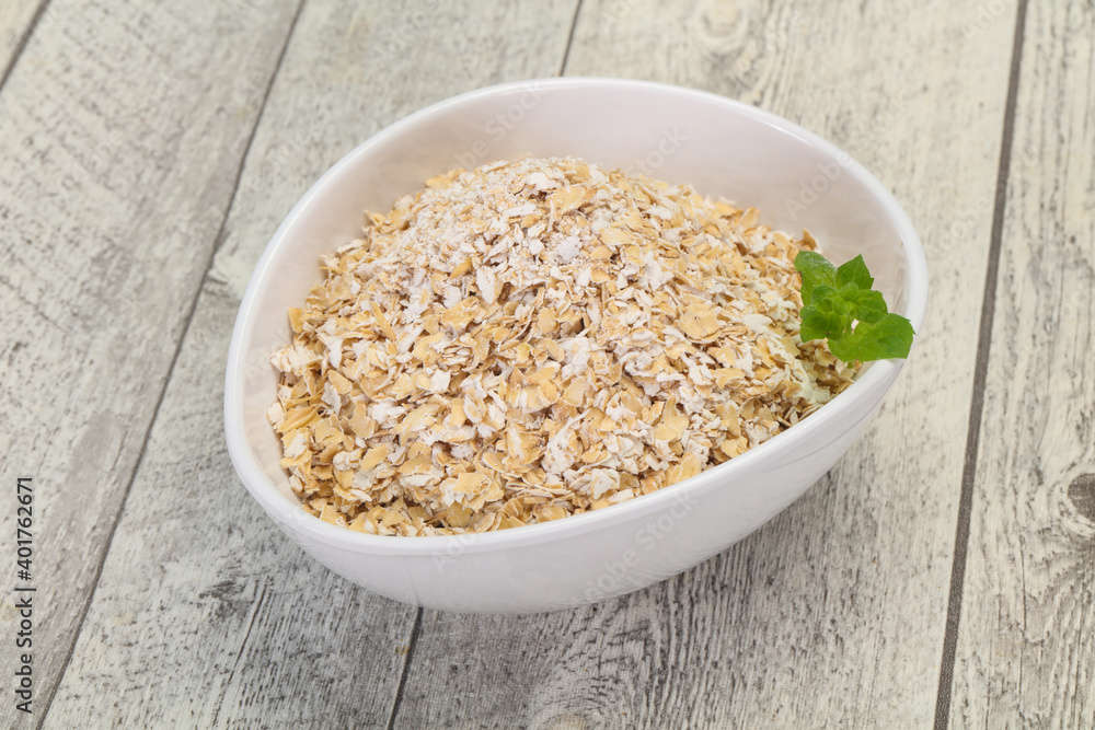 Raw oats in the bowl Raw oats in the bowl