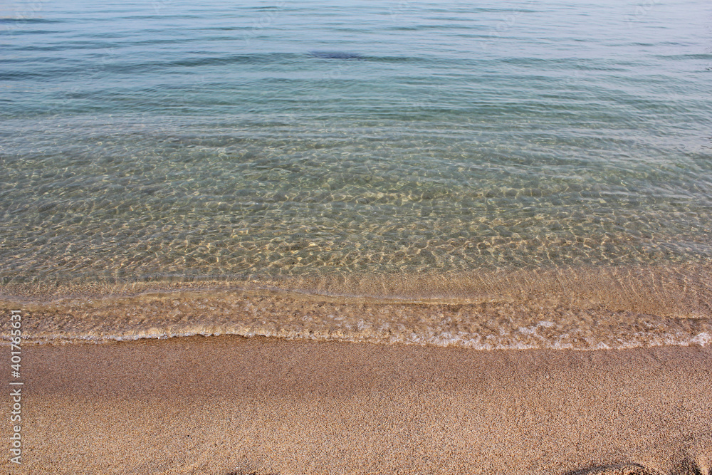 Soft beautiful ocean wave on sandy beach. Background Soft beautiful ocean wave on sandy beach. Background
