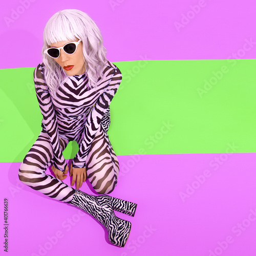 Party Girl in fashion clothes zebra print Tropically ungle africa style photo