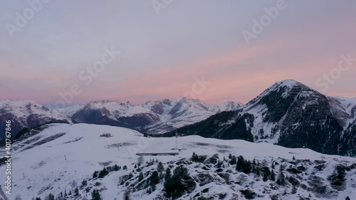 Drone shot of a closed ski resort because of Corona Virus beautiful sunrise light on fresh snow