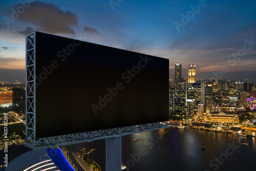 Photography Blank black road billboard with Singapore cityscape background at night time