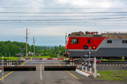 TRANS-Siberian railway, electric freight locomotive at the crossing