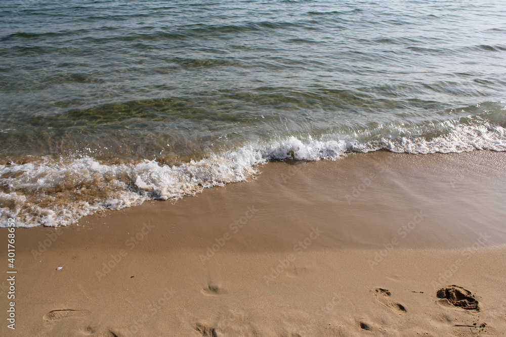 Soft beautiful ocean wave on sandy beach. Background Soft beautiful ocean wave on sandy beach. Background