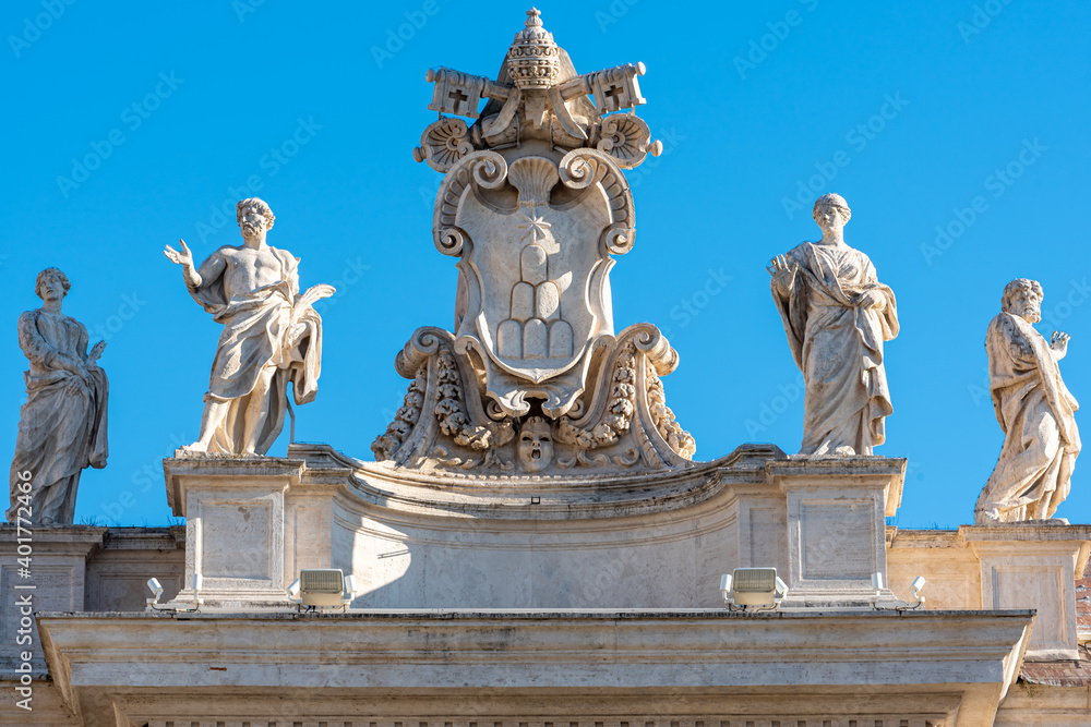 Close-up on marble statues of building facade in Rome