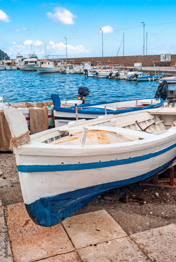 View of the fishing harbor of Lipari island, in the Aeolian Archipelago, group of small volcanic islands, located in the Mediterranean Sea, between the shores of Sicily and Calabria Regions (Italy).