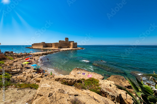 View of the village of Le Castella (Calabria Region, Southern Italy), with its medieval fortress and the Ionian Sea shorelines.