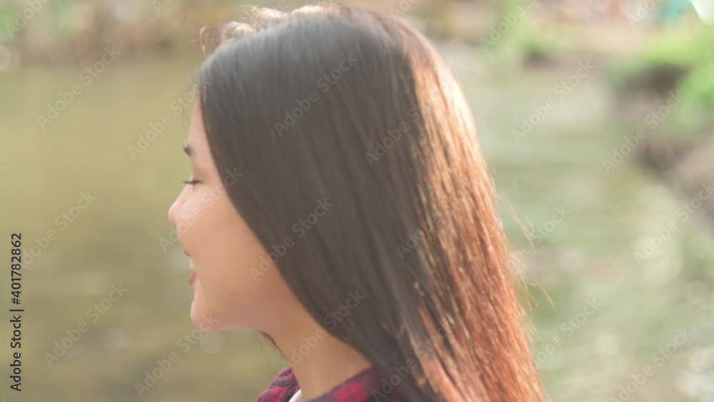 a young woman is enjoying with nature , holiday and travel concept . a young woman is enjoying with nature , holiday and travel concept .