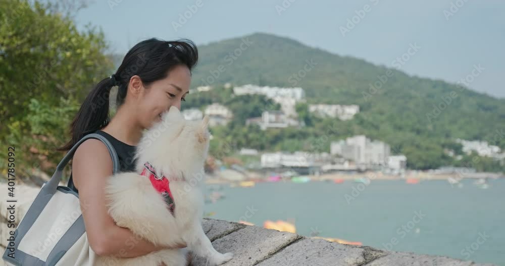 Woman go out with her dog Woman go out with her dog