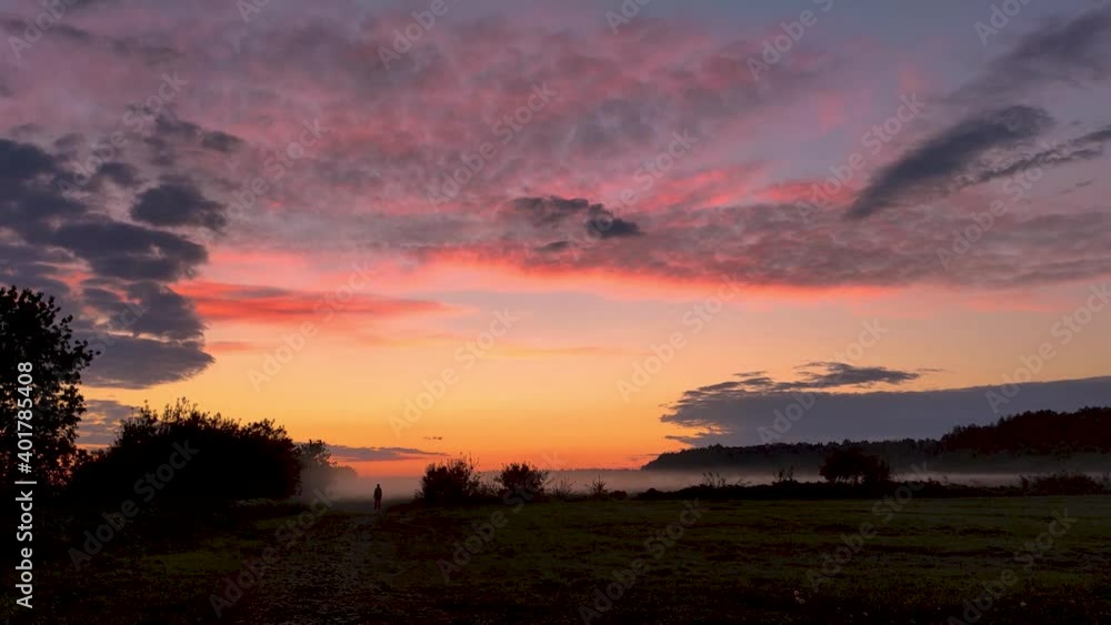 fog in the field. sunset. silhouettes of people. fog in the field. sunset. silhouettes of people.
