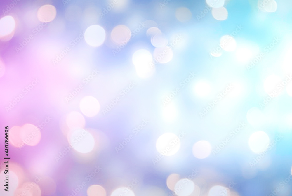 Holiday blurred lights.Christmas glowing bokeh.Violet and blue defocused blur. Holiday blurred lights.Christmas glowing bokeh.Violet and blue defocused blur.