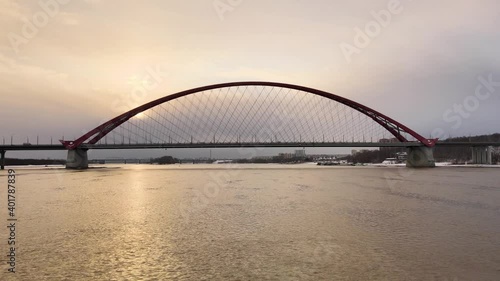 Aerial photography at low altitude. Passage over water. Novosibirsk Bugrinsky Bridge photo