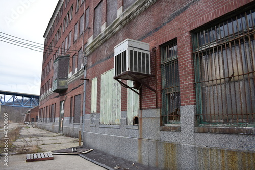 Abandoned rust belt town brick buildings bars boarded windows Brownsville Pennsylvania 2019